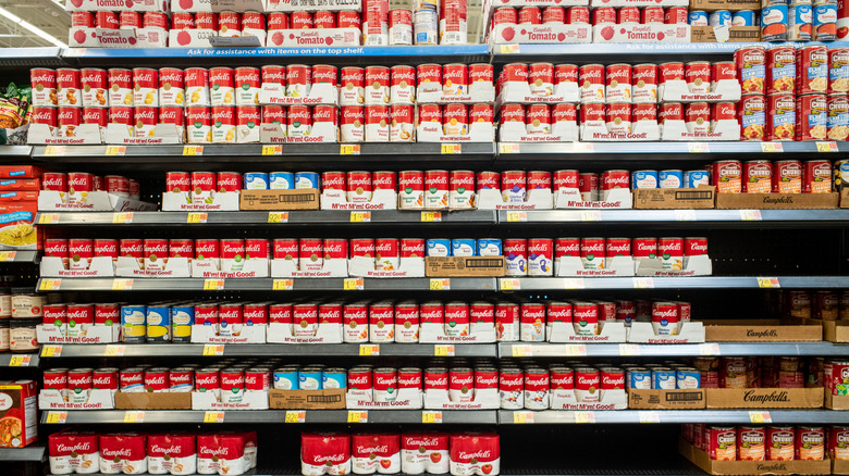 Many shelves stocked with Campbell's soup at a grocery store