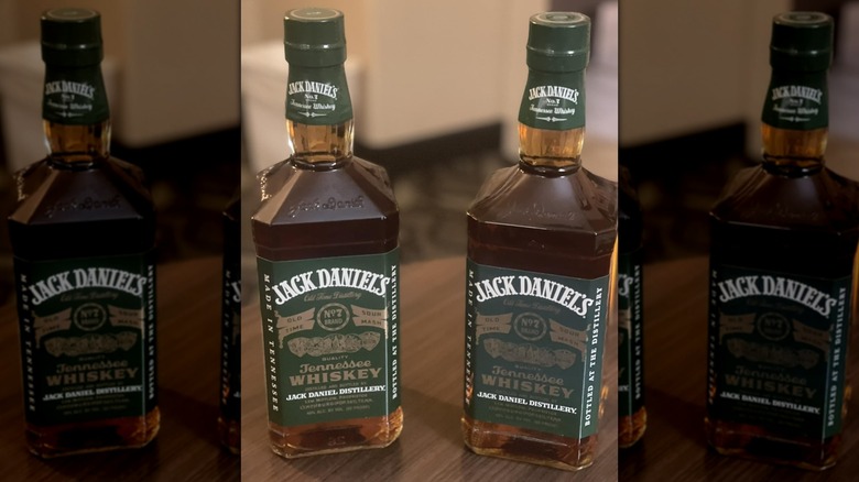 Two bottles of Jack Daniel's Green Label whiskey on a table