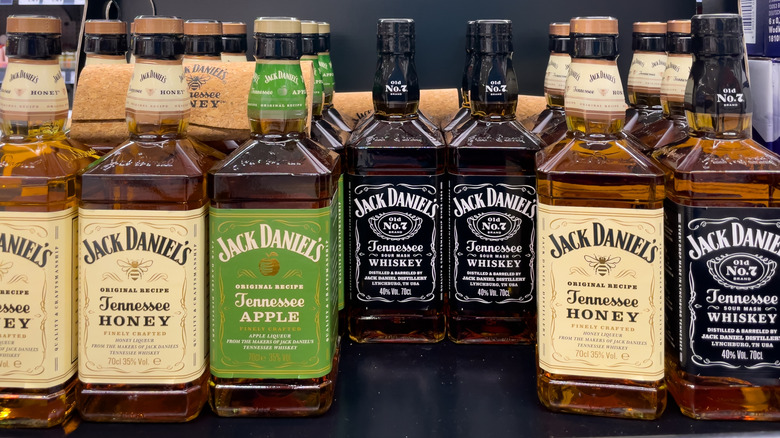 a selection of Jack Daniel's whiskey bottles on a shelf