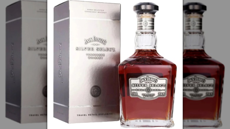 A box of Jack Daniel's Silver Select whiskey sitting next to the bottle