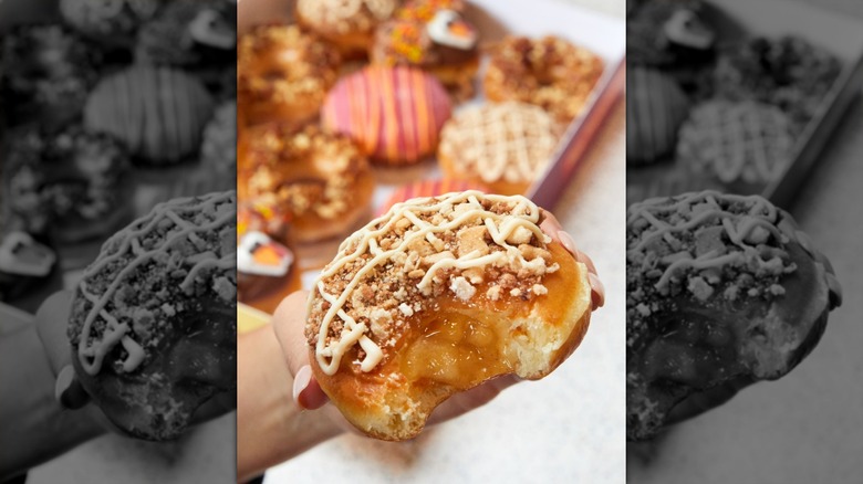 A box of Krispy Kreme doughnuts, including Dutch Apple Pie