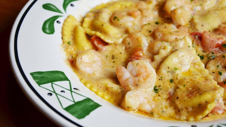 A plate of Shrimp Mezzaluna at Olive Garden
