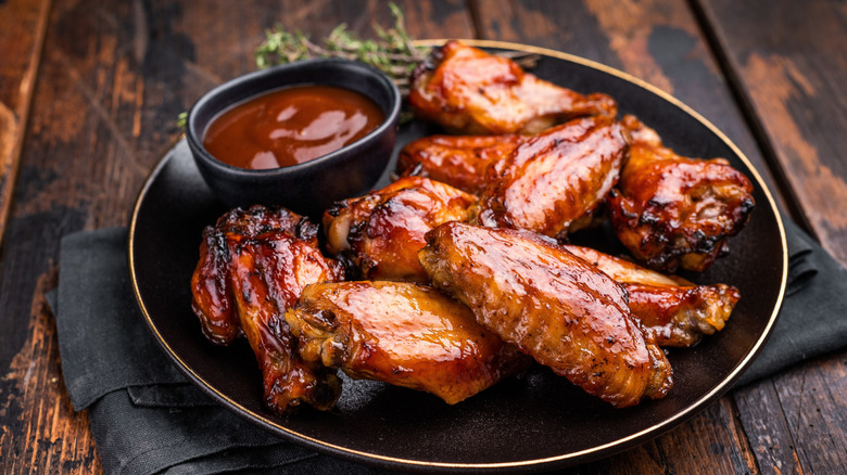 glazed baked chicken wings served with dipping sauce