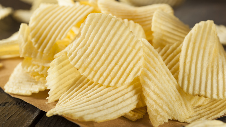 Pile of Ruffles crinkle cut potato chips