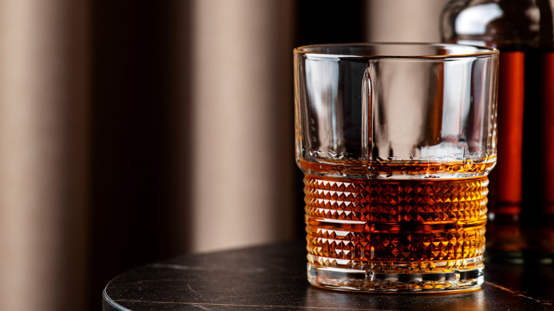 A glass of bourbon.
