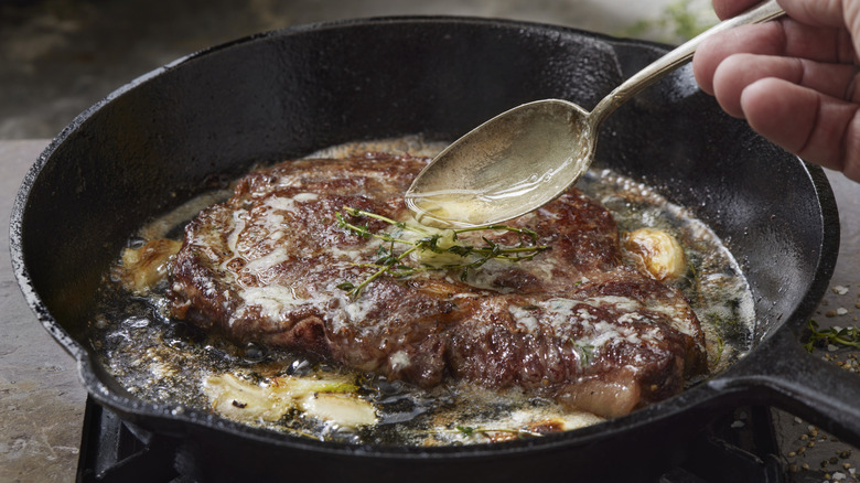 Basting steak in butter