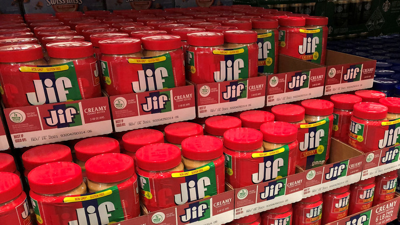 Stack of Jif peanut butter at store