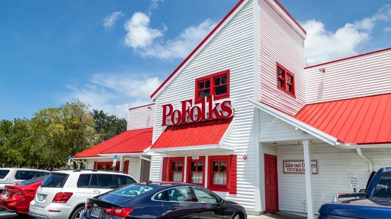 PoFolks restaurant exterior with cars parked in front of the building