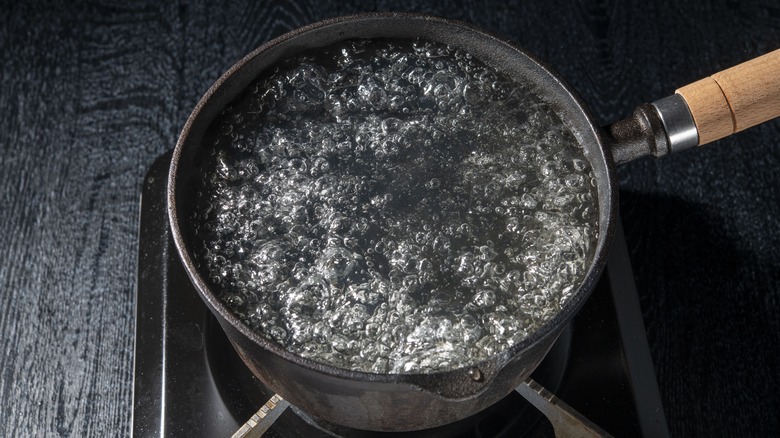 Water boiling in a pot on the stove