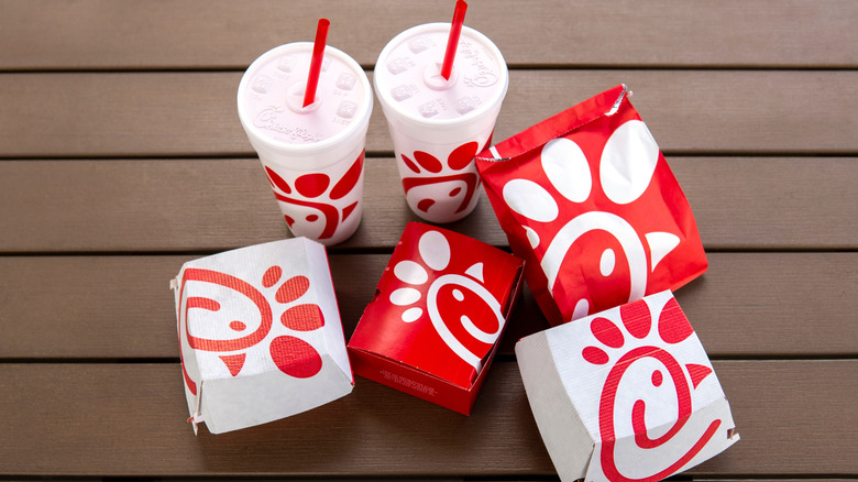 Top-down view of Chick-fil-A meal with three boxes, a bag, and two drink cups