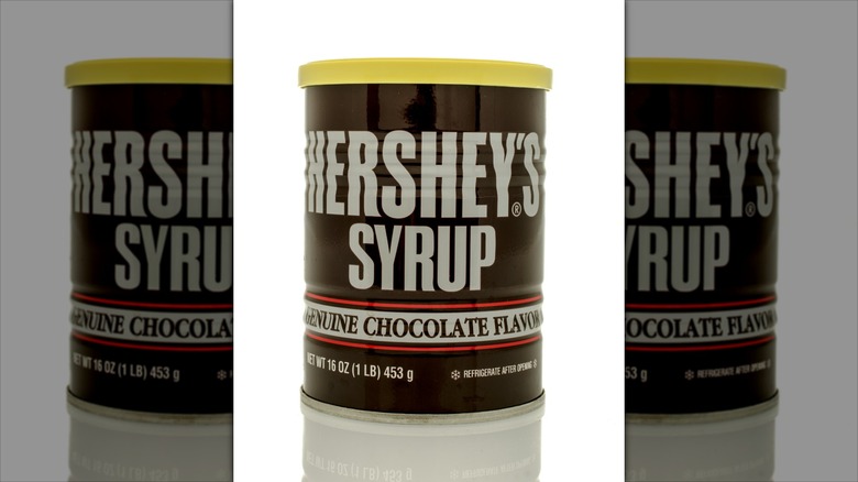 A closeup on the label of a can of Hershey's Chocolate Syrup