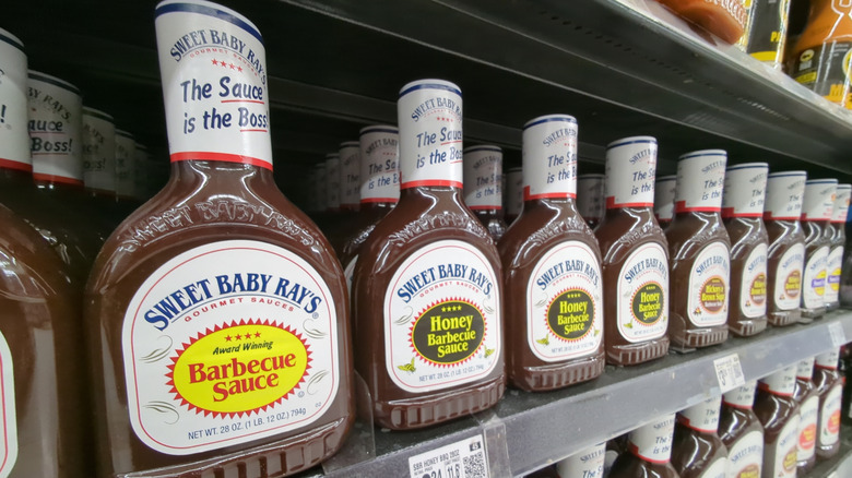 a row of Sweet Baby Ray's honey barbecue sauce