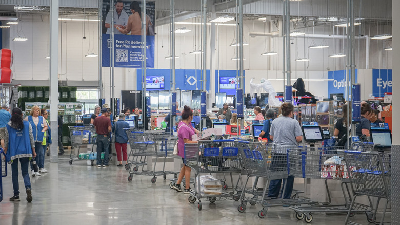 People checking out at Sam's Club