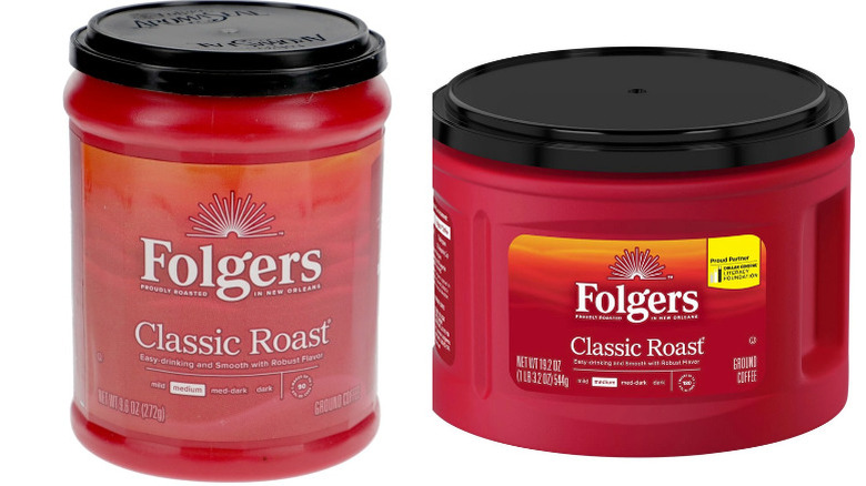 Two 9.6-ounce cans of Folgers classic coffee on a white background