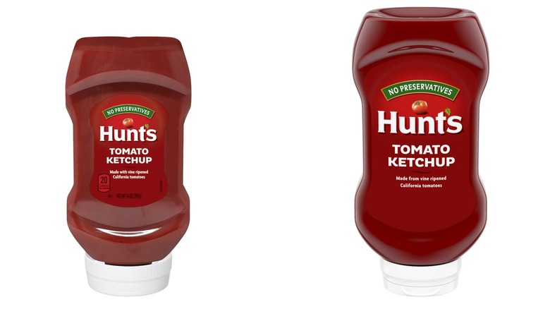 Two squeeze bottles of Hunt's Tomato Ketchup the first in 14-ounce and the second in 20-ounce on a white background