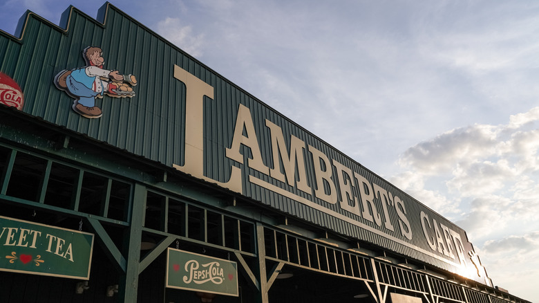 Exterior of Lambert's Cafe featuring roll-throwing mascot