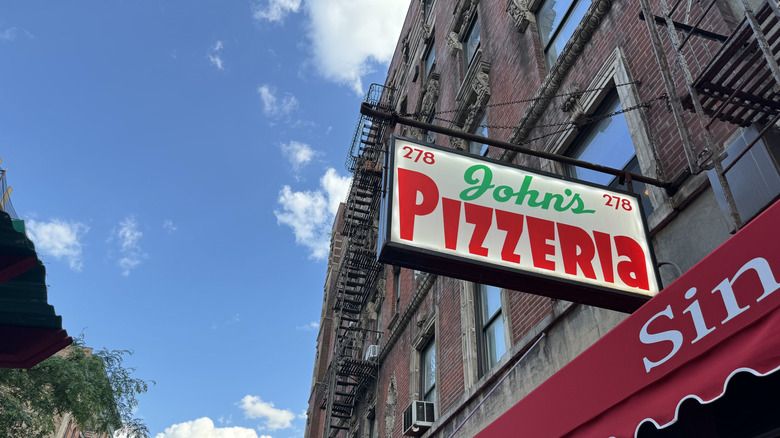 The sign outside of famed John's pizza in NYC.