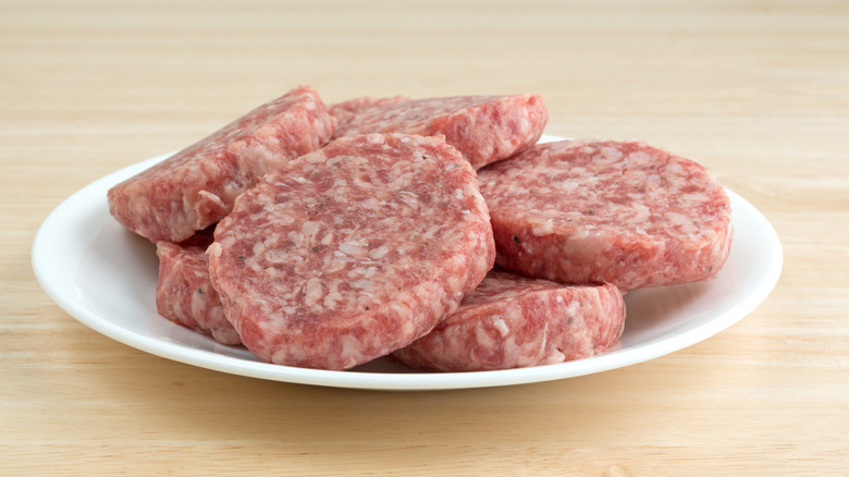 sausage patties on a white plate