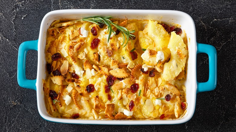 Pineapple casserole in a white and blue dish