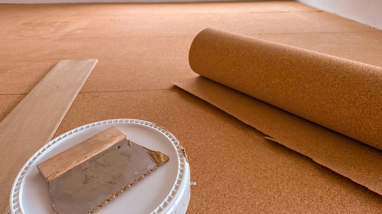 A clork flooring installation underway in a home.