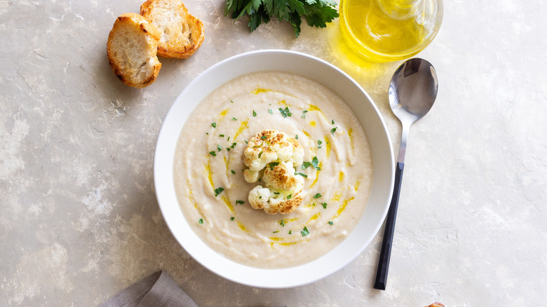 Cauliflower soup garnishes with roasted cauliflower