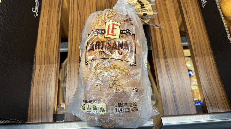 Artisinal-style white bread on store shelf