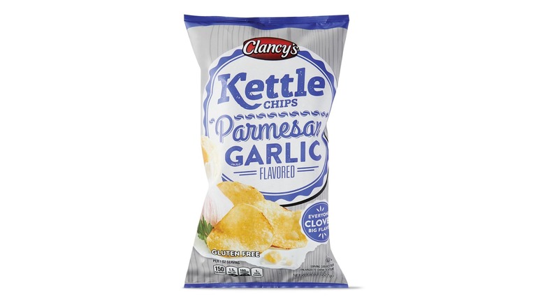 A gray, blue, and white bag of Clancy's Kettle Chips in Parmesan Garlic flavor