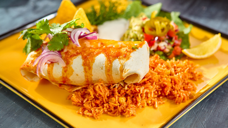 Burrito with a side of Mexican rice
