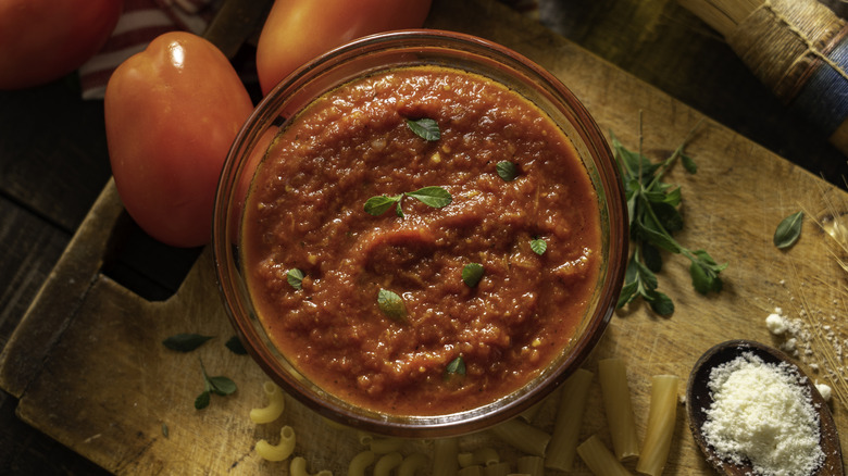 tomato sauce surrounded by tomatoes