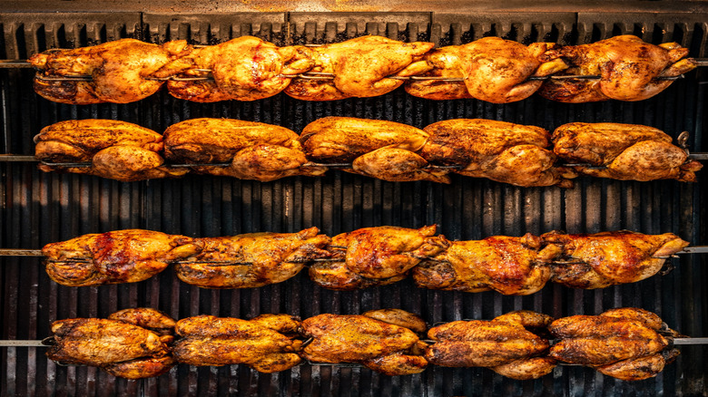Rotisserie chickens roasting