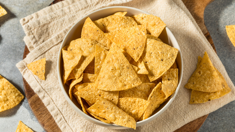 Doritos chips in a bowl on a cloth