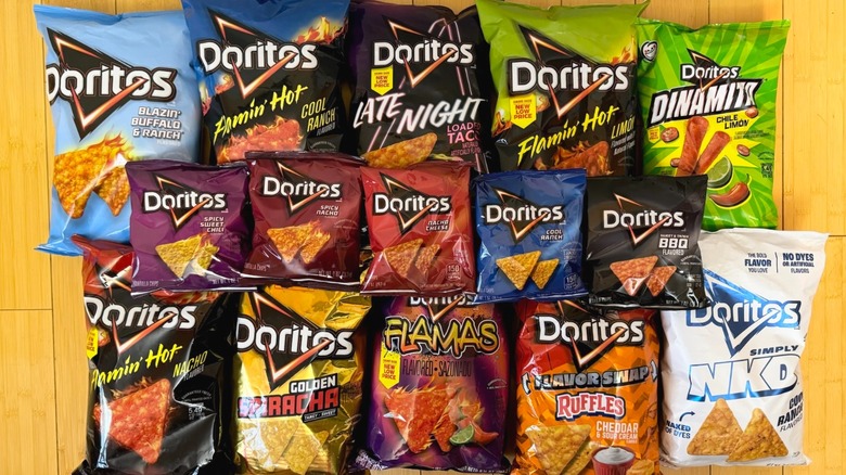 overhead view of various Doritos flavors on wooden surface