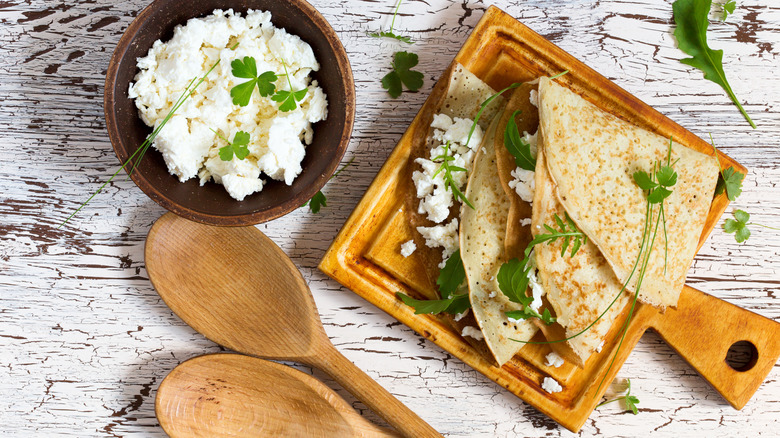 Crepes stuffed with dry cottage cheese