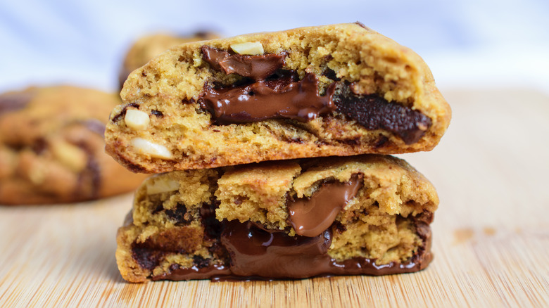 Stack of gooey chocolate chip cookies
