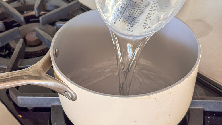 water pouring into pot