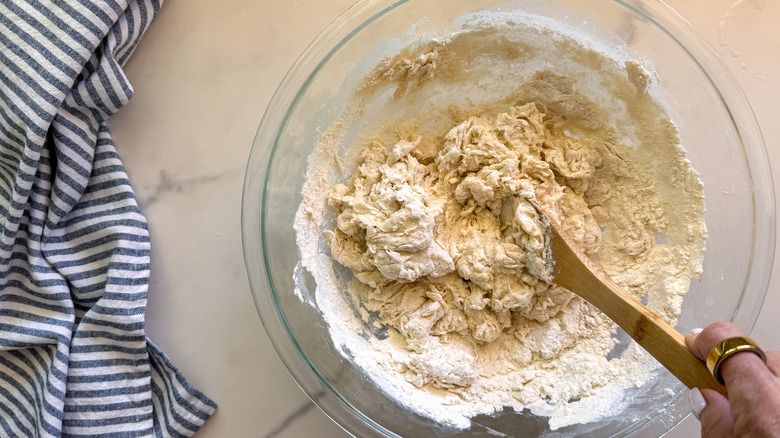 hand mixing flour and water