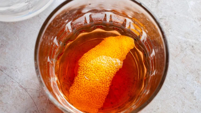 Classic Sazerac cocktail  with lemon peel garnish