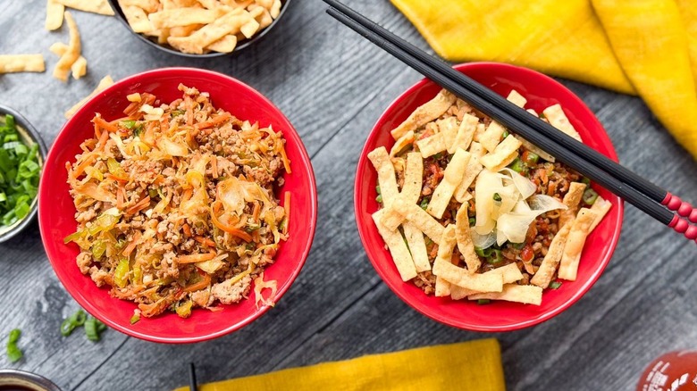 Pork egg roll in a bowl with and without garnishes
