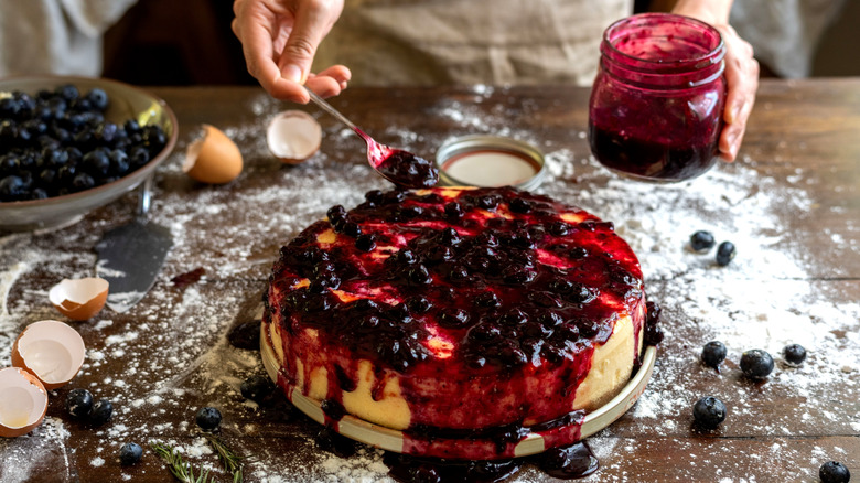baked cake with powdered sugar and blueberries