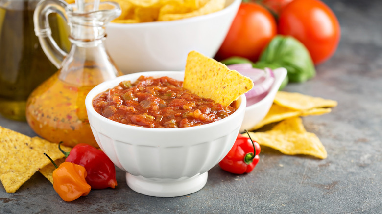 fresh red tomato salsa in a white bowl