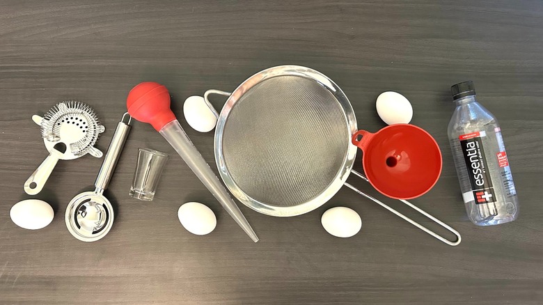 Various gadgets for separating egg yolks from their whites and several whole eggs