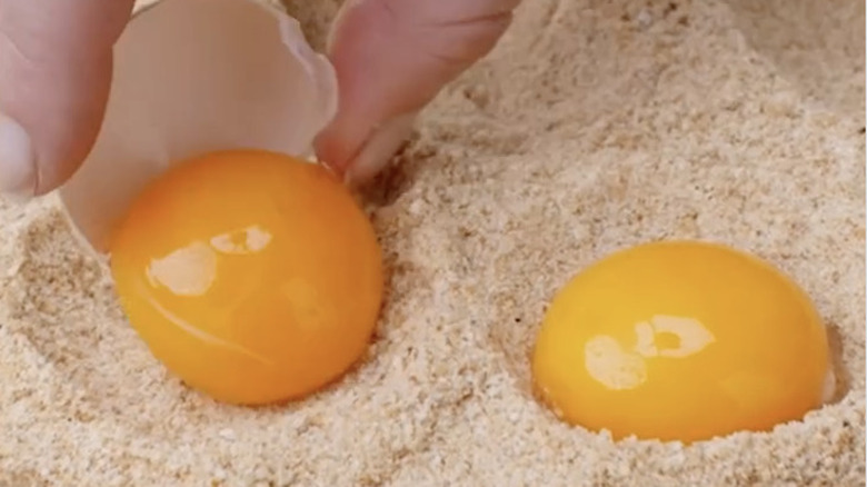 egg yolks in a bed of breadcrumbs