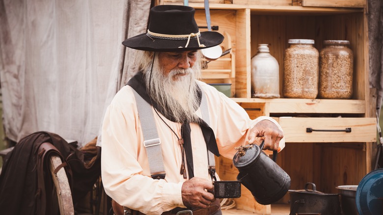 Pouring coffee in historical attire