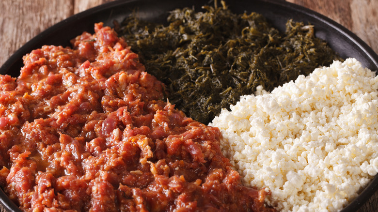 Kitfo with ayib cheese and greens