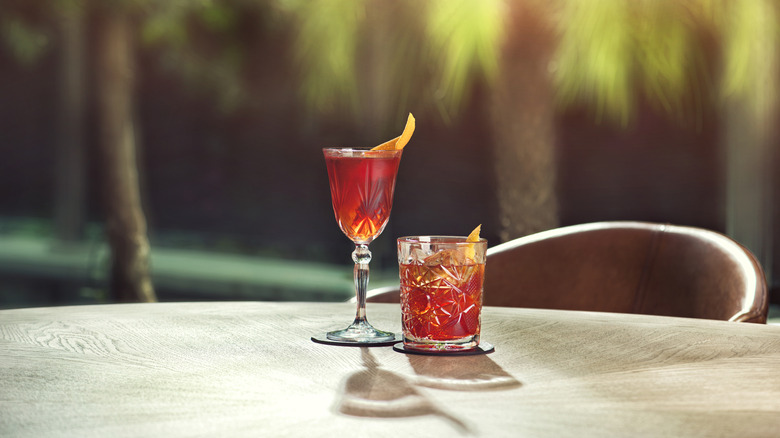 two negronis in deifferent glasses