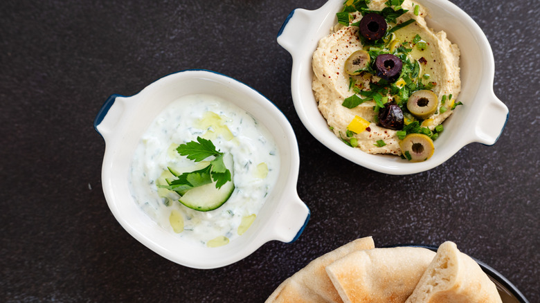 Hummus and tzatziki with pita bread