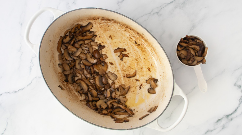 Sauteed mushrooms with ⅔ cup removed from Dutch oven