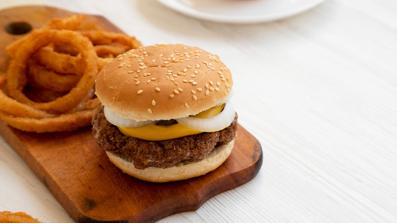 A Mississippi slug burger with a side of onion rings