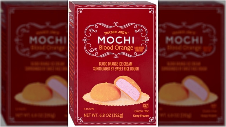 Box of Trader Joe's Blood Orange Mochi, showing one whole and one half mochi on a tray
