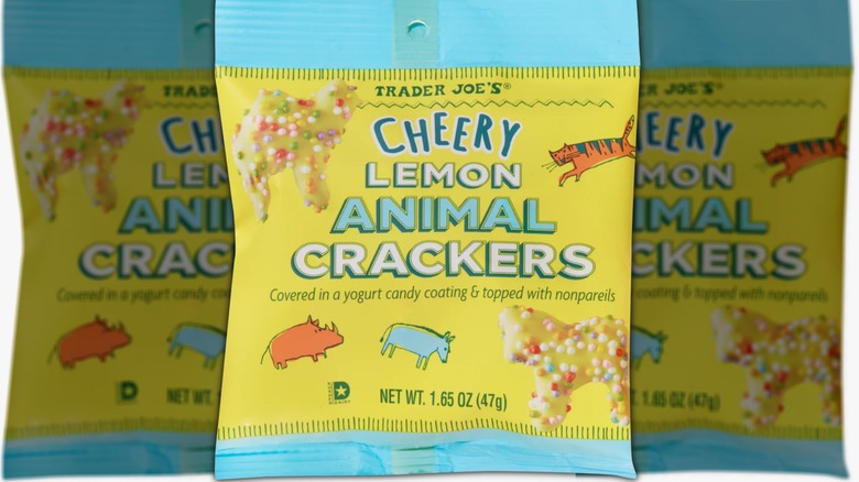 Yellow and blue bag of cookies showing cartoon animals and pictures of frosted cookies covered with nonpareils